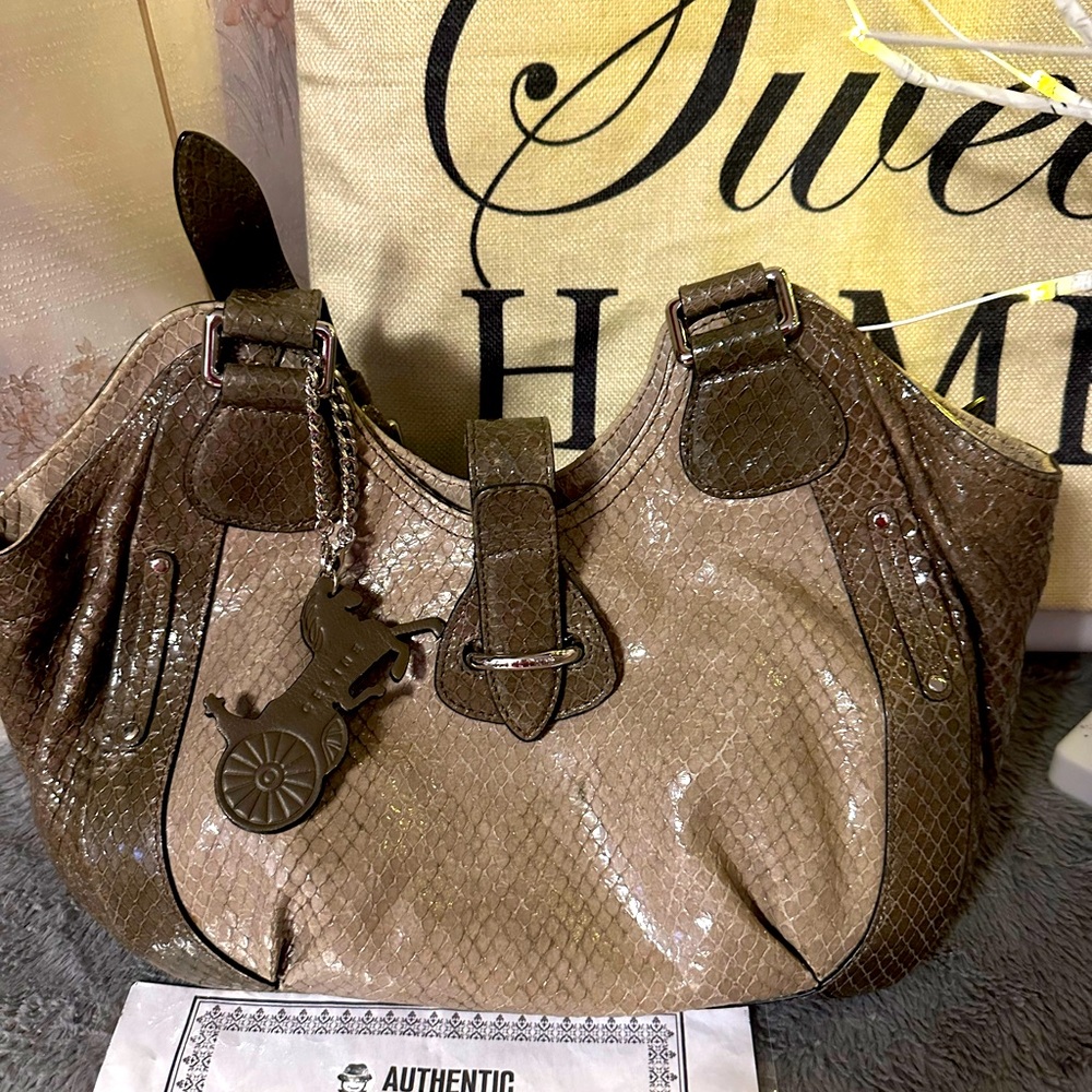Celine leather snakeskin handbag. COA